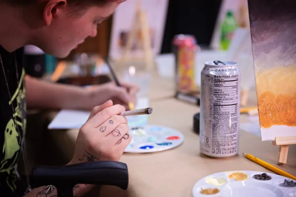 Painting a sunset on canvas