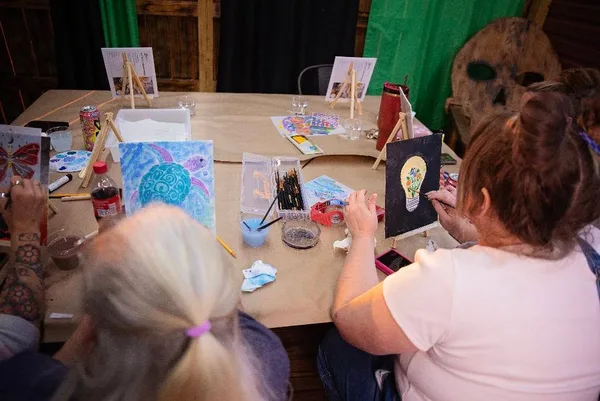 A closer look at the paintings around the table