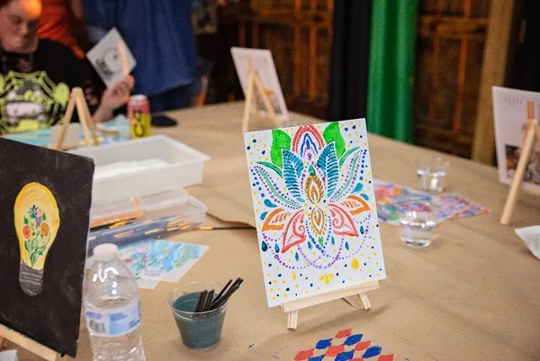 A colorful floral canvas on its easel