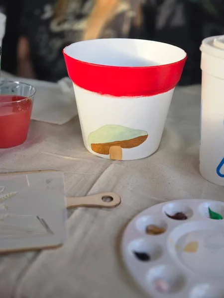 A colorful painted mushroom pot