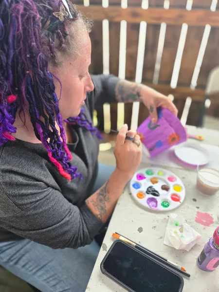 Adding details to a purple flower pot