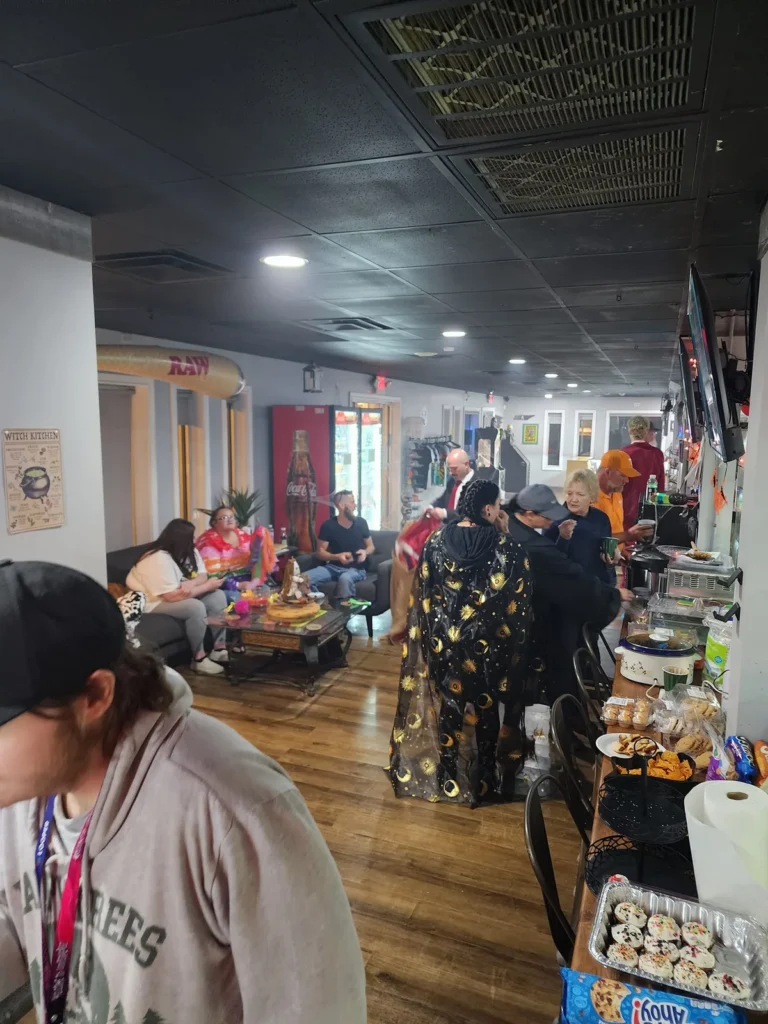 Guests gathered around tables inside the store.