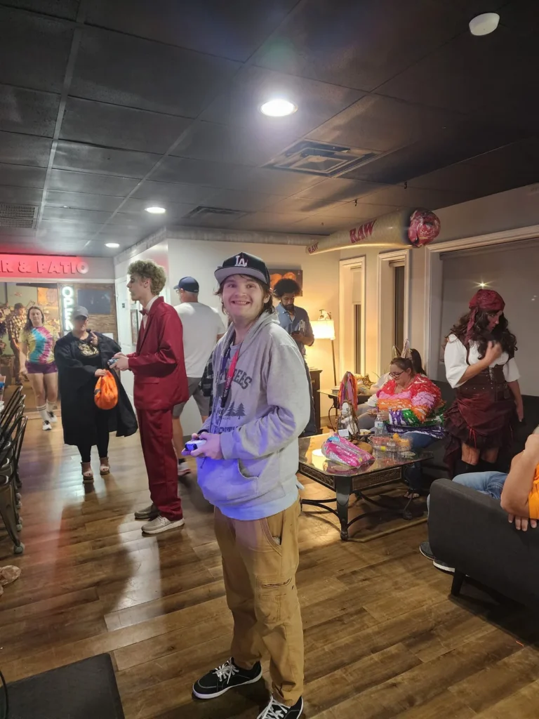 Costumed guests pose together inside the store.