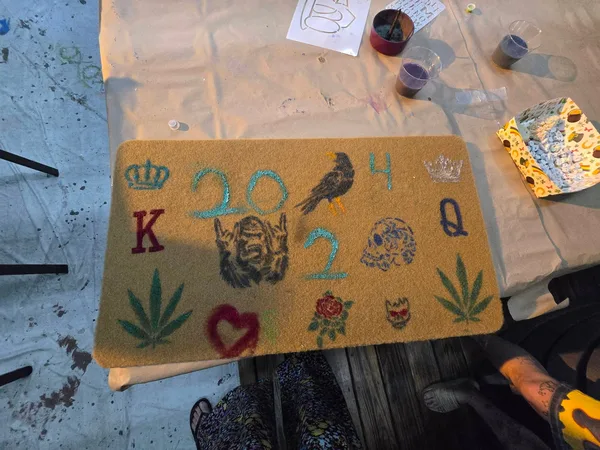 A custom doormat filled with hand-painted details